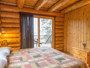 Log Home Bedroom Interior - Benson