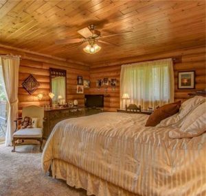 Log Home Bedroom Interior - Buckeye