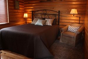 Log Home Bedroom - Mangrove