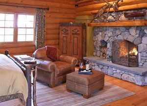 Log Home Bedroom with Fireplace - Vail