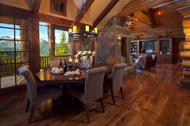 Curvy Lines Inside a Log Cabin Home Dining Area
