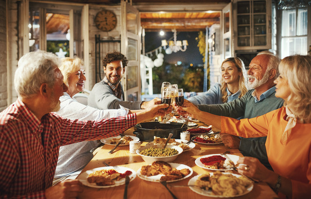 Family having Thanksgiving dinner.