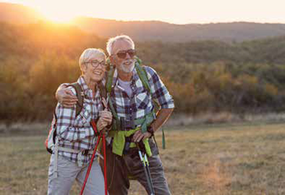 Woman and Man Holding Each Other in the Wilderness